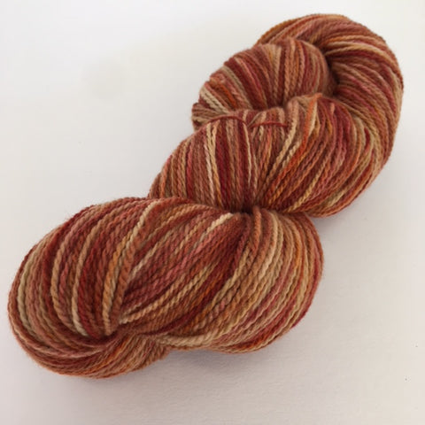 Rust and brown variegated Rambouillet yarn